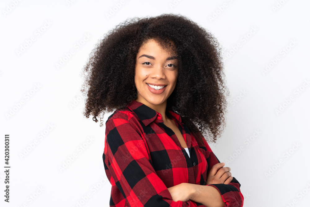 Young african american woman over isolated background with arms crossed and looking forward Young african american woman over isolated background with arms crossed and looking forward