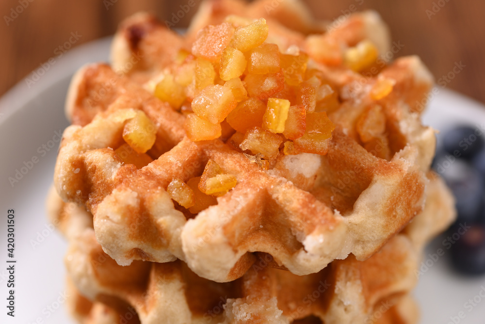 Appetizing waffles with jam for dessert. Appetizing waffles with jam for dessert.