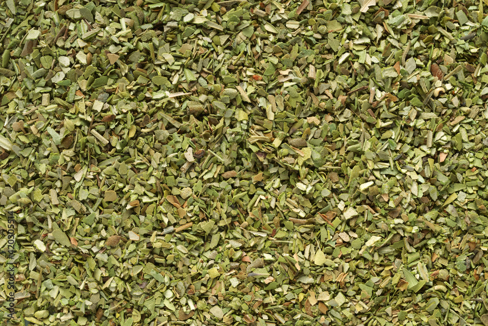 Pile of dried green oregano texture or background. - obrazy, fototapety, plakaty 