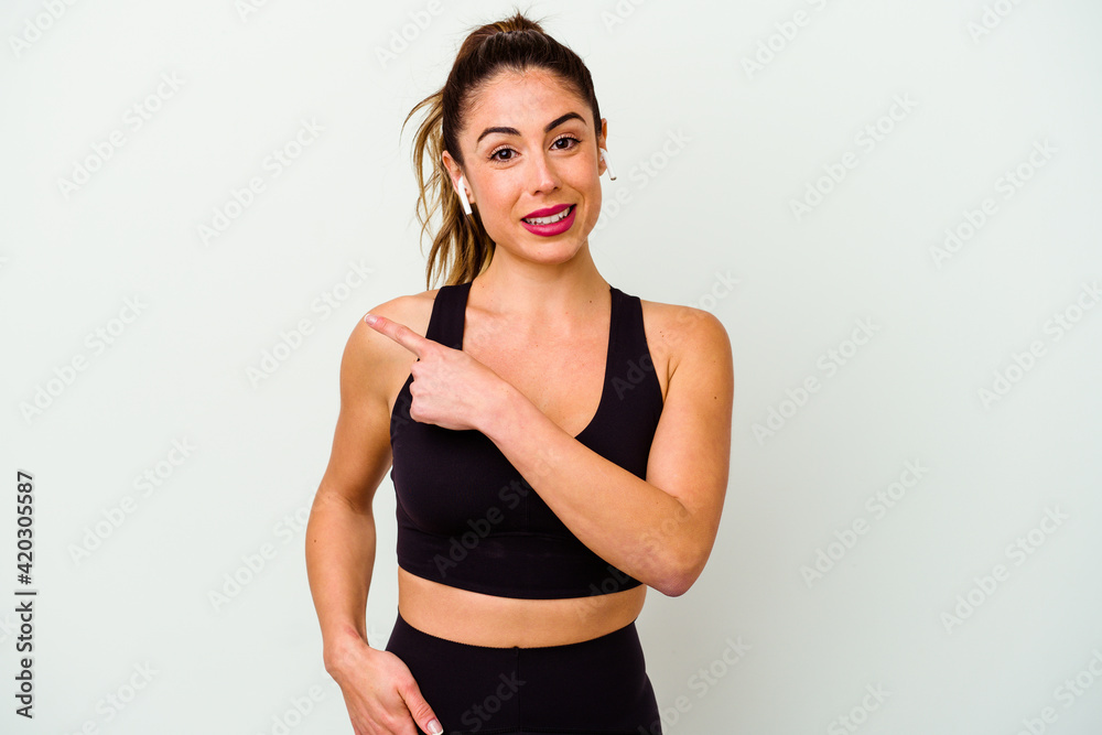 Young sport caucasian woman isolated on white background