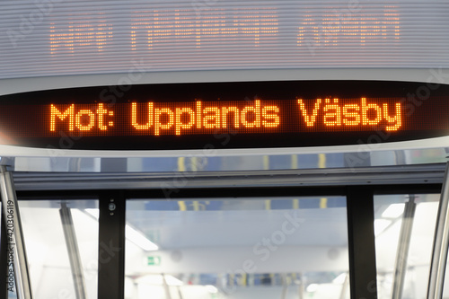 Stockholm commuter train interior destination Upplands Vasby sign.