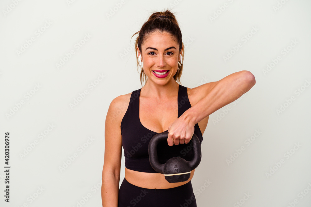 Young fitness woman with dumbbells isolated on white background Young fitness woman with dumbbells isolated on white background