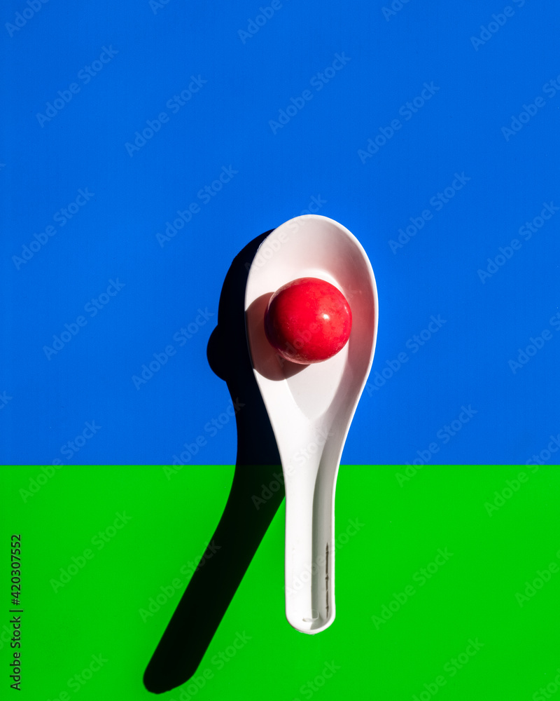 Graphic plastic spoon with red sphere Graphic plastic spoon with red sphere