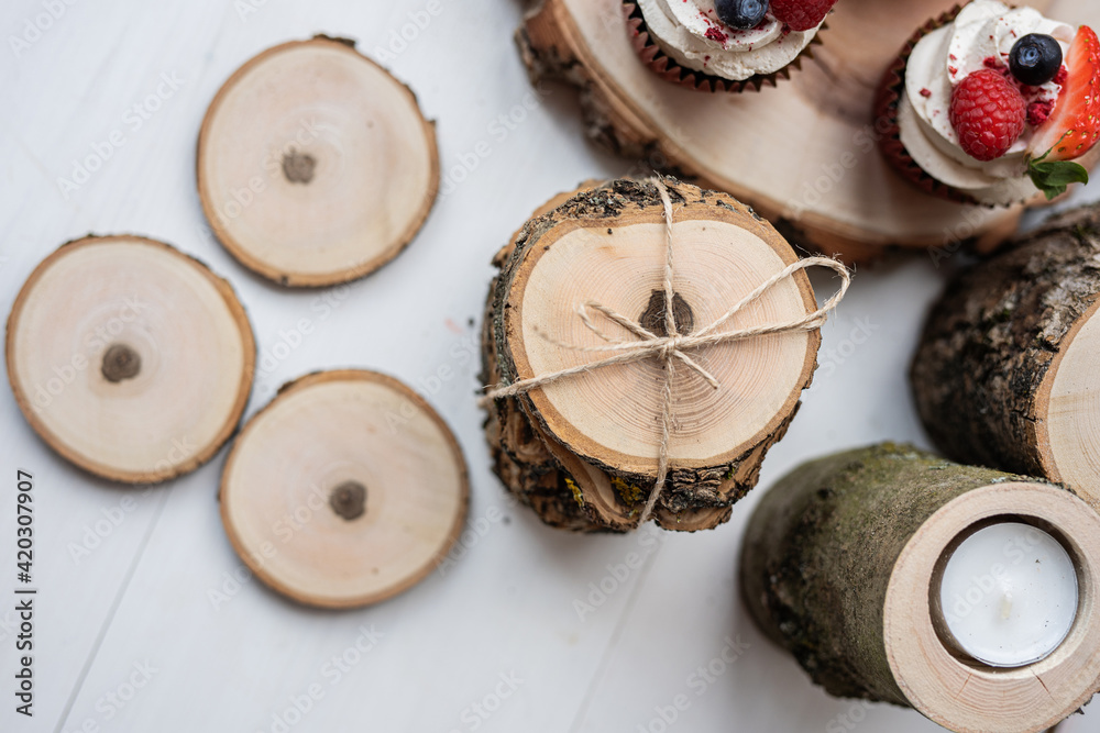 Fototapeta premium natural ash tree raw log slice coasters with bark 