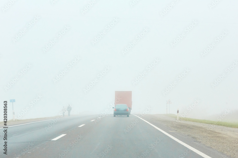 Fototapeta premium traffic in the fog