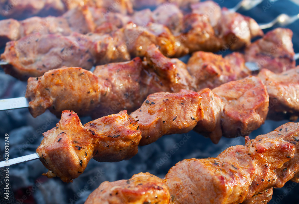 grilled barbecue meat on skewers