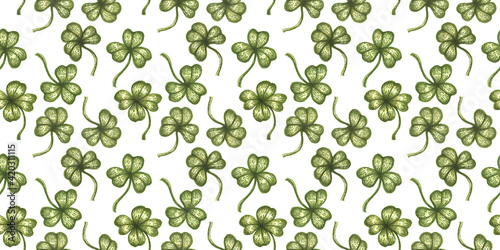 Vintage seamless pattern with lucky clover.
