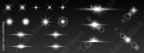 Valokuva Realistic lens flares star lights and glow white elements on transparent backgro