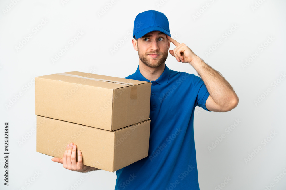 Delivery man over isolated white background having doubts and thinking