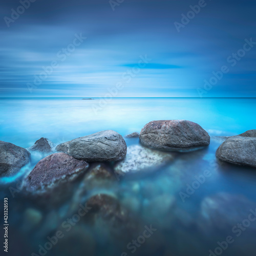 Rocks and soft sea  long exposure photography landscape.