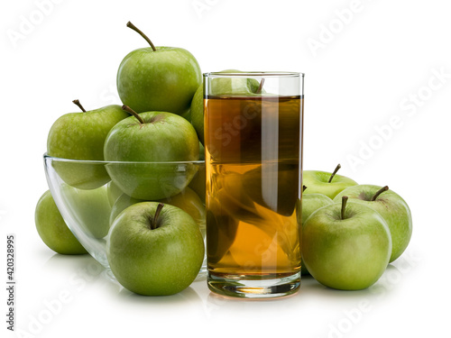 Apple juice and fruits of green apples in glassware