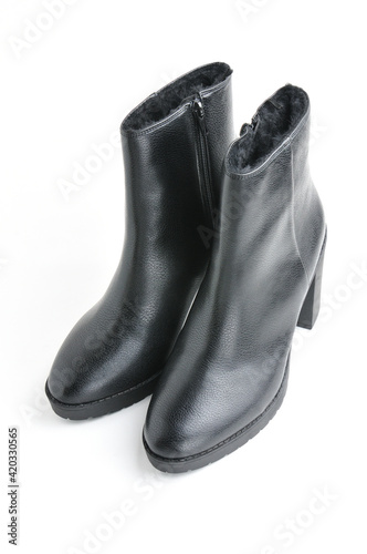 Leather female ankle boots on a white background