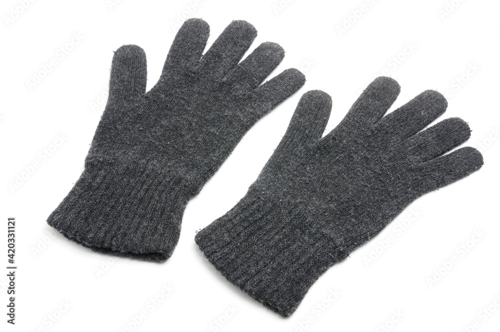 Winter knitted woolen gloves on a white background Winter knitted woolen gloves on a white background