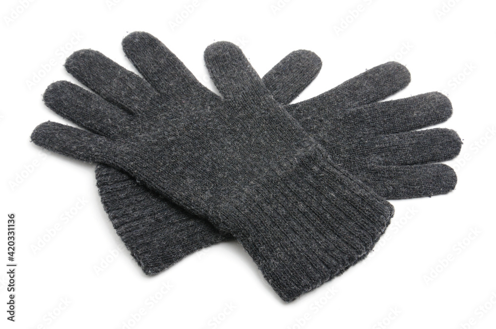 Winter knitted woolen gloves on a white background Winter knitted woolen gloves on a white background