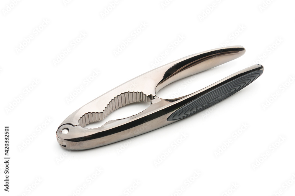 Tongs for nuts on a white background Tongs for nuts on a white background