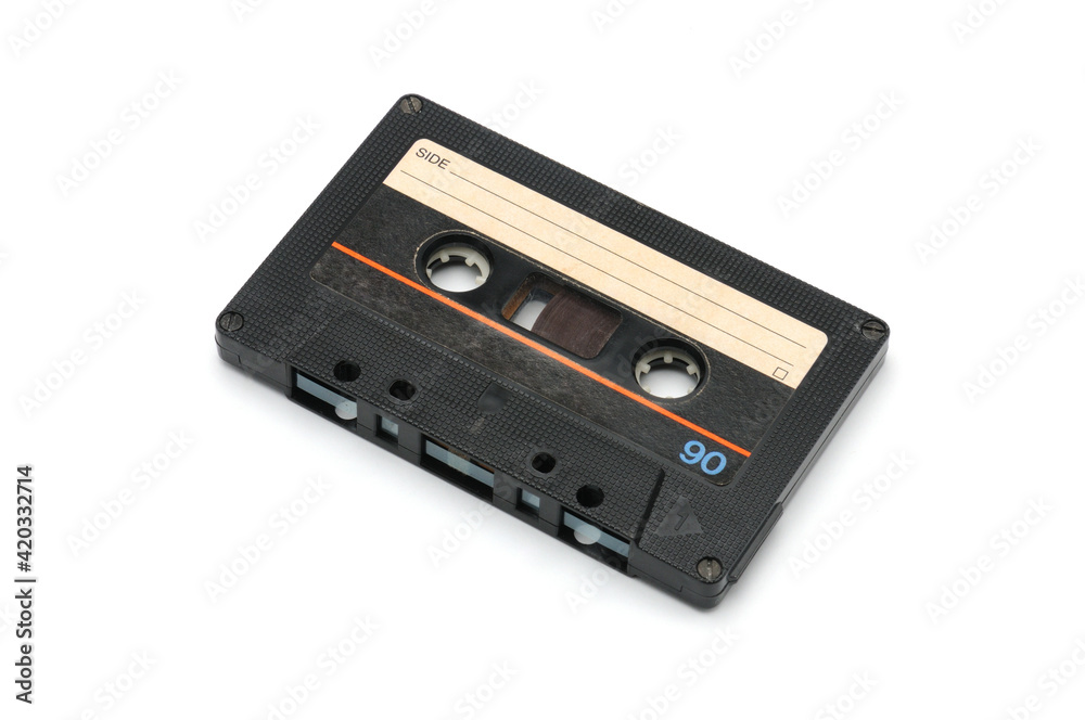 Vintage compact audio cassette on white background