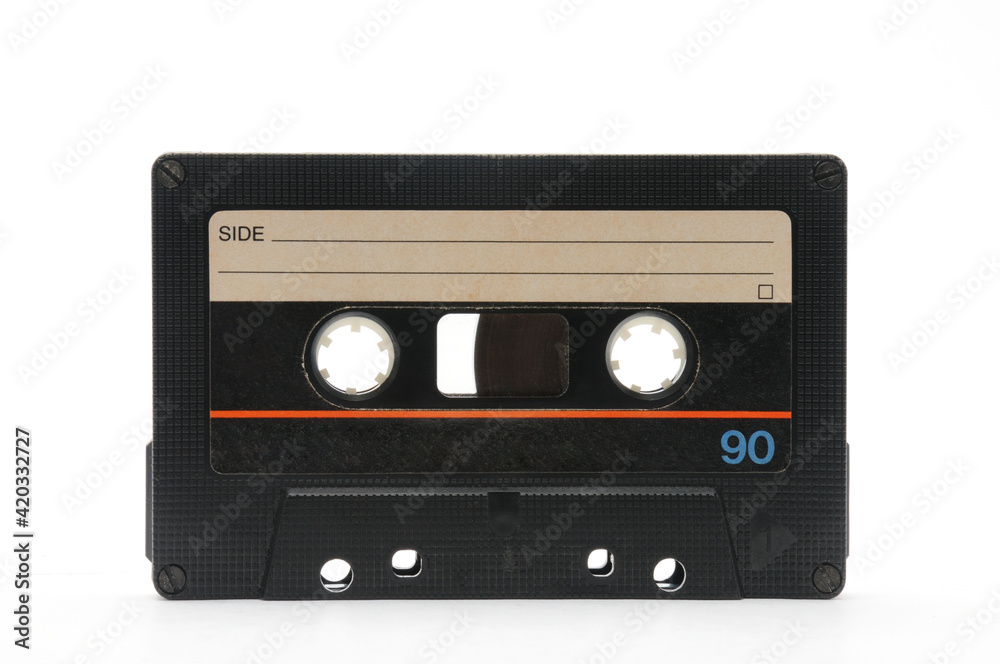 Vintage compact audio cassette on white background