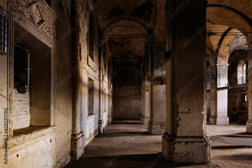 Interior of dark creepy abandoned lutheran church of the Virgin Mary