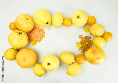yellow fruit arrangement on white background