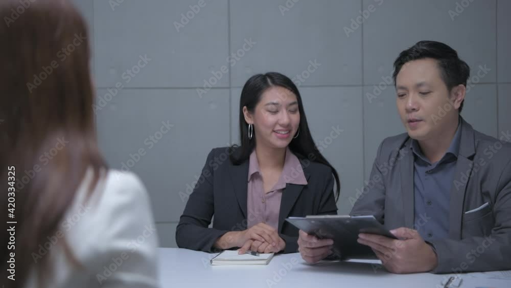 Business concept of 4k Resolution. Businessmen negotiate successful jobs in the office. Business concept of 4k Resolution. Businessmen negotiate successful jobs in the office.