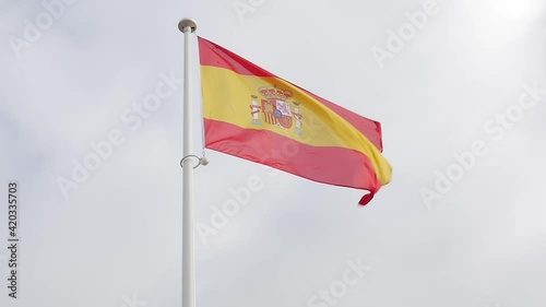 Flag of Spain. view of Spanish flag on a pole, Slow motion shot for news, Spain is a European country in Europe where there is a discussion about catalan independence 
