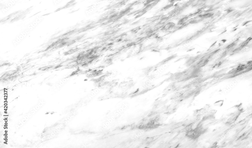Marble texture abstract background coming from natural stone. White marble panel has a beautiful dark pattern that is empty.