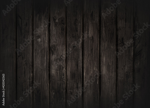 Black wood texture background coming from natural tree. The wooden panel has a beautiful dark pattern  hardwood floor texture