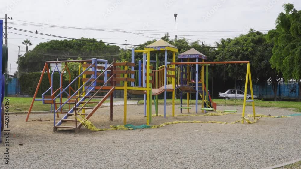 close-up of playgrounds and swings for children closed by the covid-19 pandemic with close-up of playgrounds and swings for children closed by the covid-19 pandemic with
