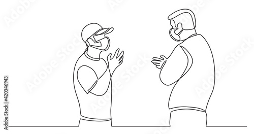 two standing men wearing face masks talking arguing