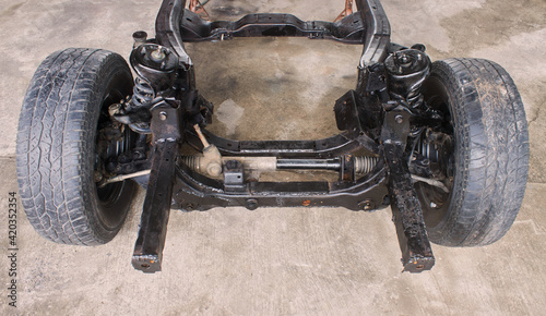 Car Chassis and Suspension System and Wheel Hub and Tire and Shock Absorber and Coil Spring and Ball Joint with Rack and Pinion