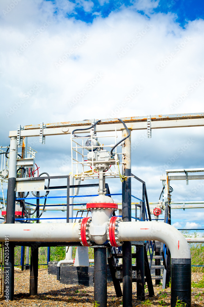 Oil and gas field. Gate valves that control the flow of gas from wells
