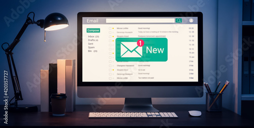 New email alert on computer, communication connection message to global letters in the workplace.