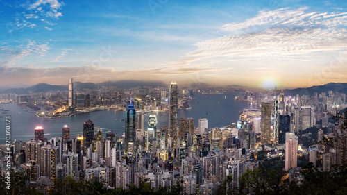 Panorama view of Hong Kong skyline on the evening seen from Victoria peak, Hong Kong, China.