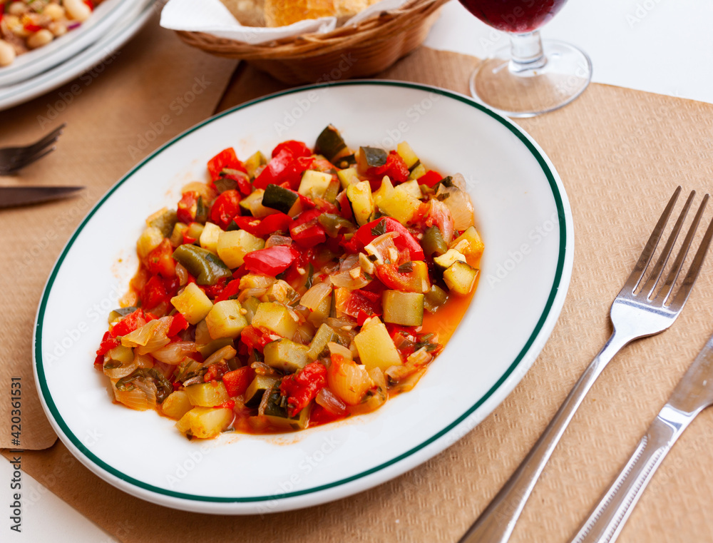 Stew with peppers, zucchini and zucchini in plate.Traditional Hungarian dish called lecho