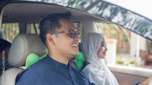 Muslim family in the car will go home to celebrate Eid © HumbaFrame