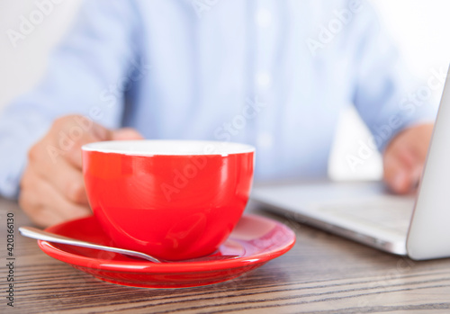 Men working over coffee