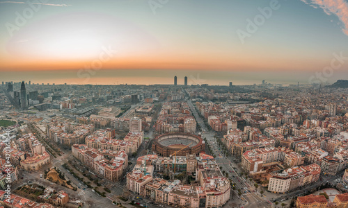 Aerial drone shot of Barcelona city before sunrise time