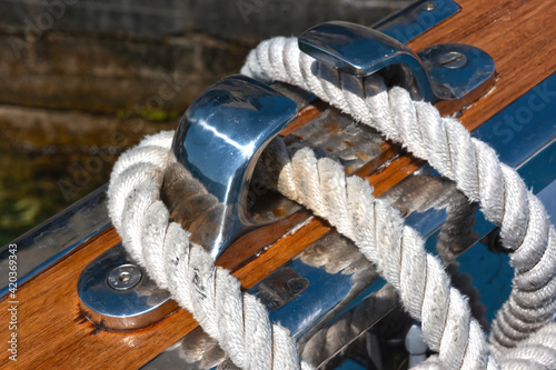 Close-up of rope tied up on a bitt