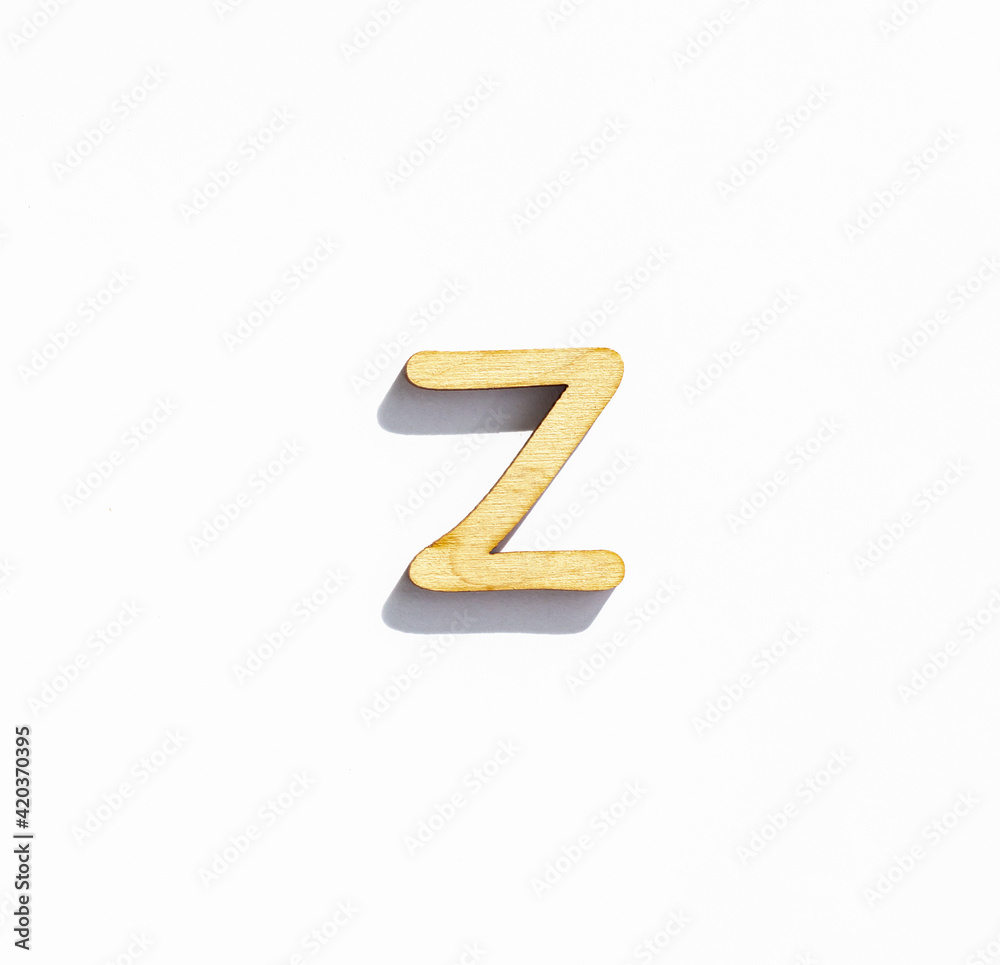 wooden letter z isolated on a white background, english alphabet from natural materials for children, eco friendly concept wooden letter z isolated on a white background, english alphabet from natural materials for children, eco friendly concept