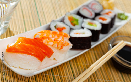 Various of sushi traditionally served with pickled ginger, wasabi and soy sauce. Japanese cuisine