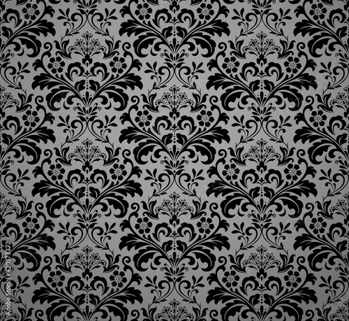 Wallpaper in the style of Baroque. Seamless vector background. Black and gray floral ornament. Graphic pattern for fabric, wallpaper, packaging. Ornate Damask flower ornament