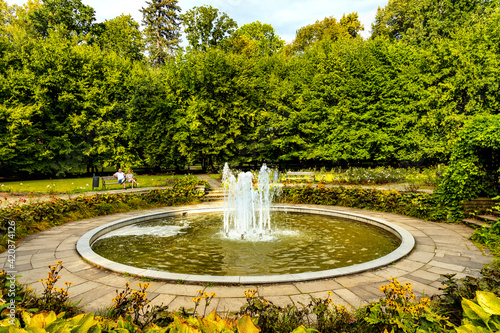 Fototapeta Naklejka Na Ścianę i Meble -  Neo-renaissance waterworks in historic Zywiec Park surrounding castle and Habsburgs palace in Zywiec old town city center in Silesia region of Poland