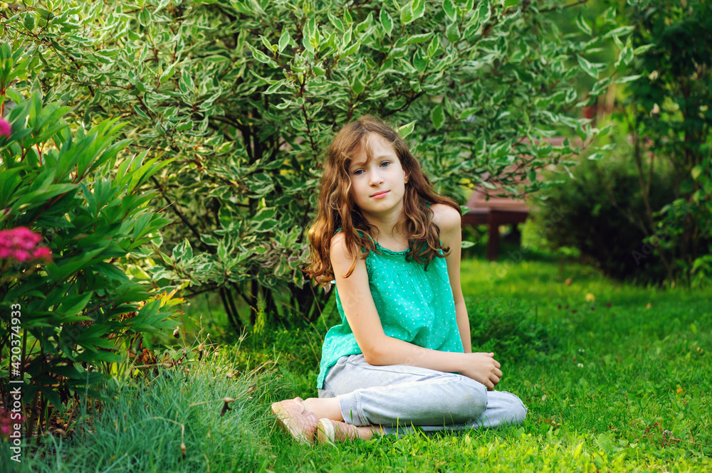 kid girl walking and relaxing in summer beautiful garden kid girl walking and relaxing in summer beautiful garden