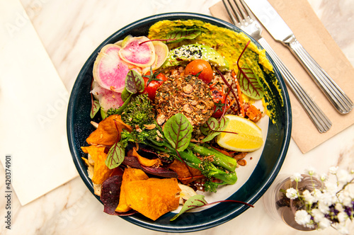 Vegan bowl with pink radish  photo