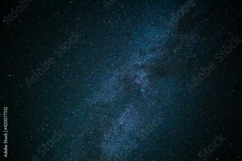 The night sky is covered with stars. Beautiful space background. © Oleksandr Masnyi