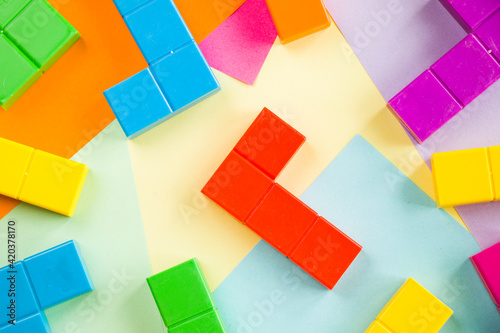 Colorful puzzle cubes background  geometric figures  table game