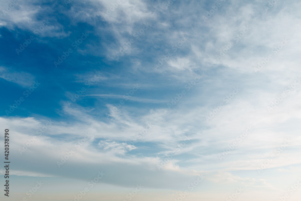 Beautiful blue sky with stretched white clouds Beautiful blue sky with stretched white clouds