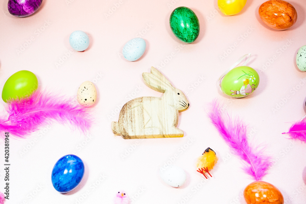 Easter eggs, Easter bunny, chicks on a pastel background