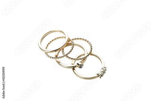Different golden rings isolated on white background