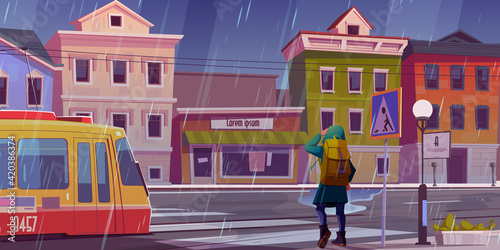 City street with houses, tram and pedestrian man